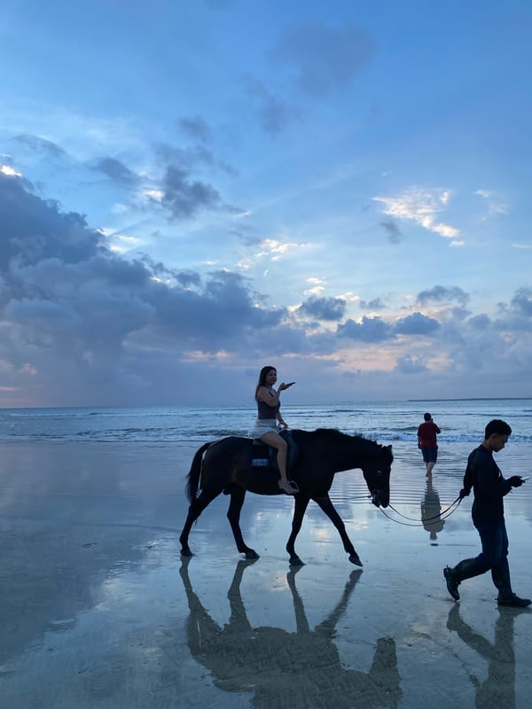 Golden hour beach gathering documented in Kuta Selatan, Indonesia