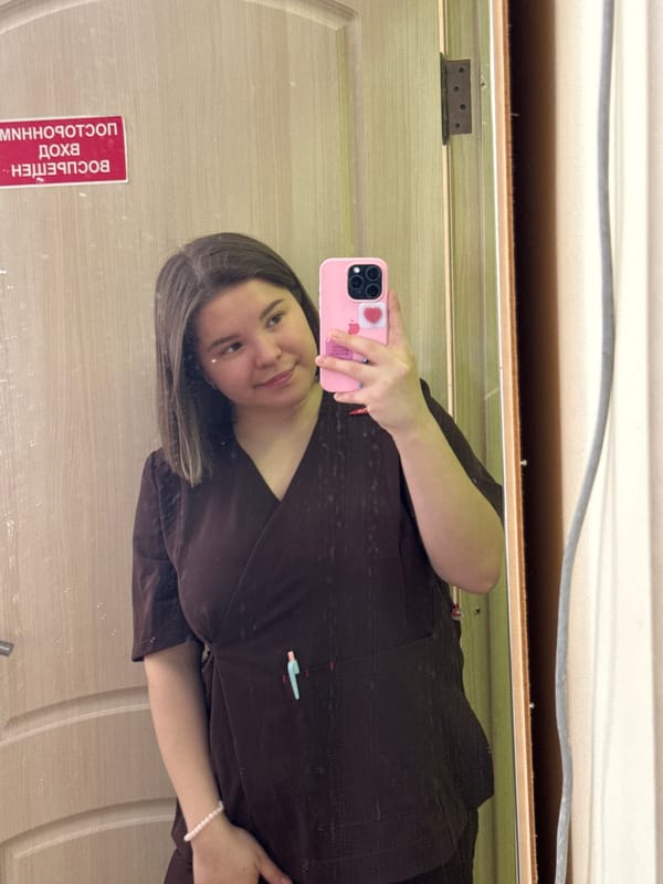 Healthcare worker takes selfie in medical facility mirror