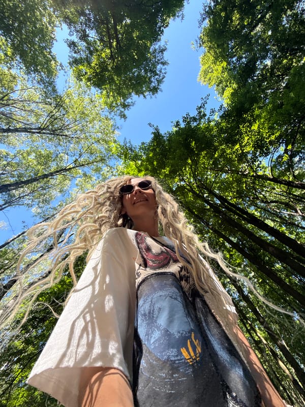 Woman photographed in forest during early morning in Rusanovo