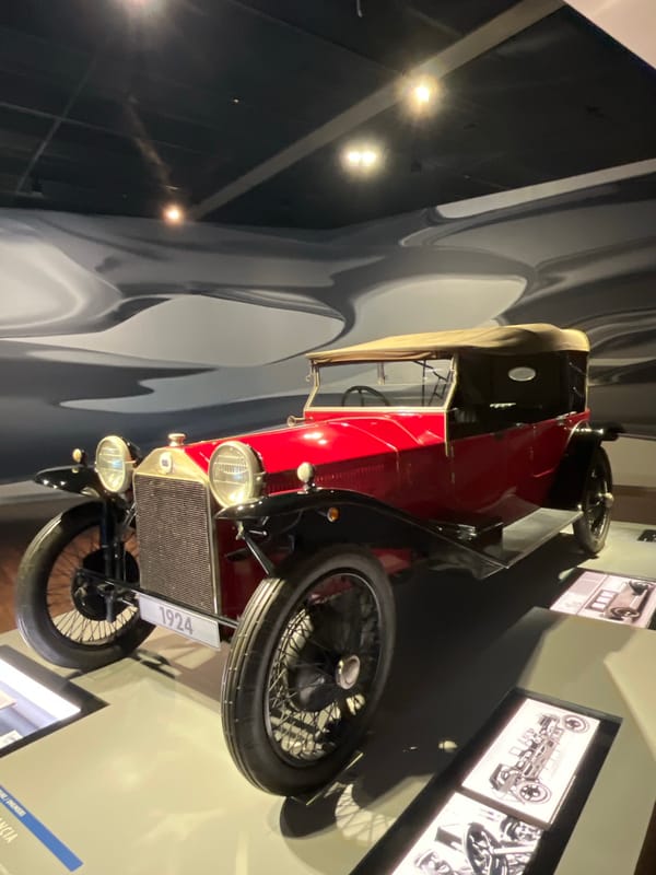 Classic cars on display at Wolfsburg's Autostadt, spanning 1899 to 1967