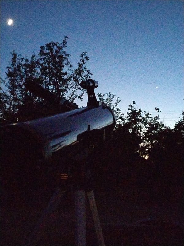 Backyard telescope session catches crescent moon at dusk