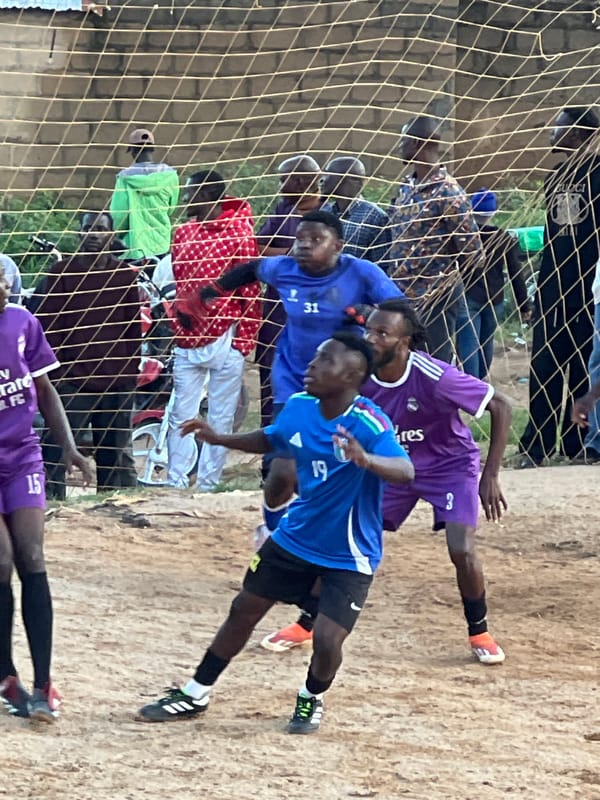 Pickup soccer match draws a crowd in Jos, Nigeria