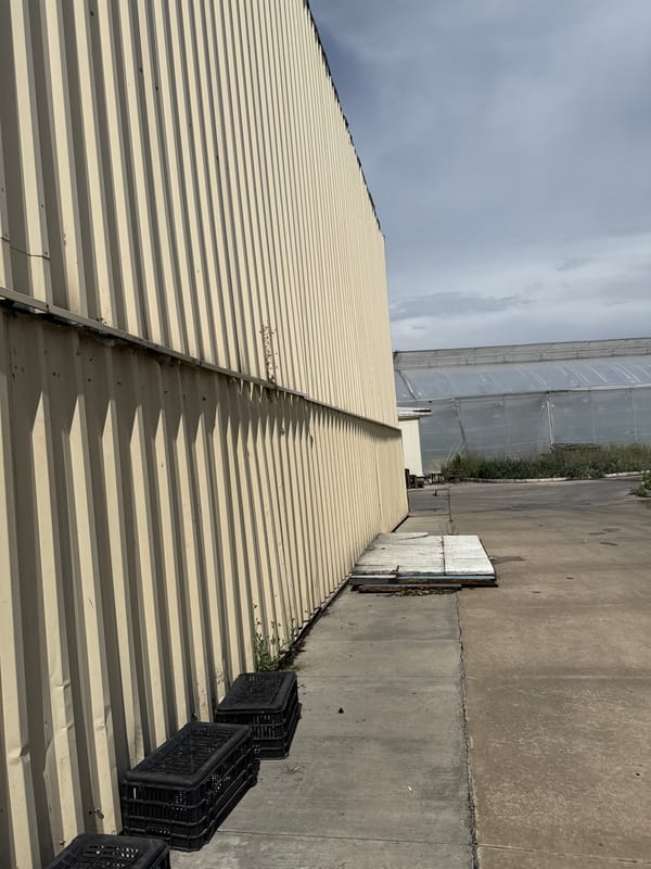 White car parked at industrial complex in Bulgaria