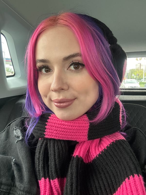 Woman with colorful hair photographed in car in Zagreb