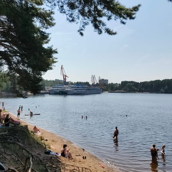 Kama River beach and park life in Chaikovsky, summer morning