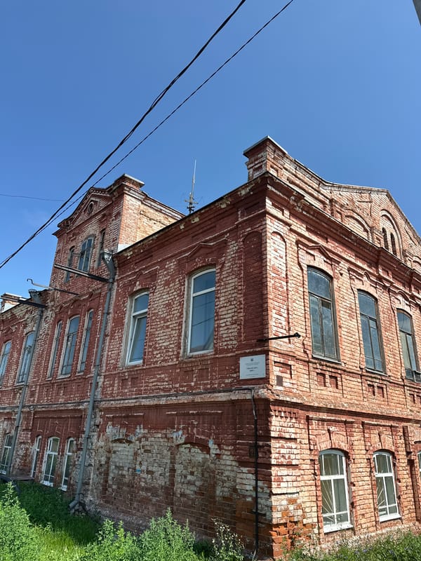 Historic brick and carved wooden buildings in Biysk, Russia