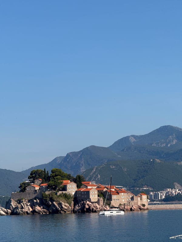 Sveti Stefan's fortified island village connected by narrow causeway