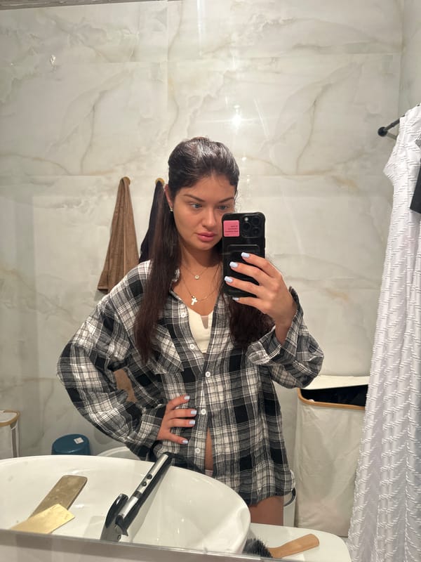 Woman takes bathroom selfie in Khimki, Russia