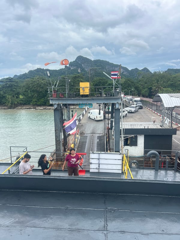 SEATRAN 4 ferry loads vehicles at a Thai terminal