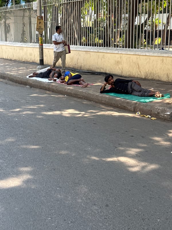 Early morning street life captured in Kolkata sidewalks