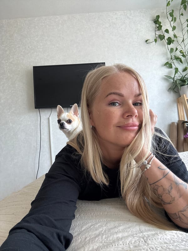 Woman documents morning routine with selfies and pet Chihuahua