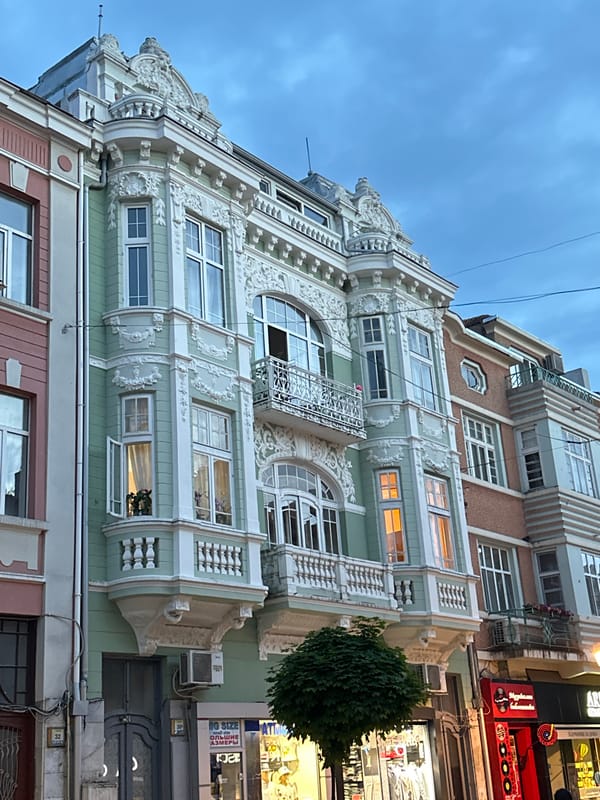 Tourist documents overcast evening walk through central Varna, Bulgaria