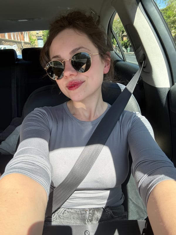 Woman in sunglasses spotted driving in Budapest