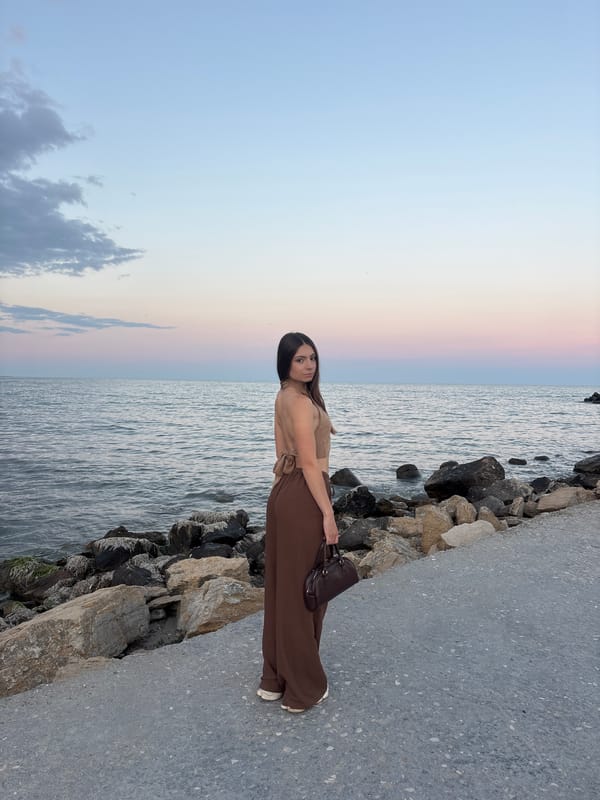 Quiet moment on Varna's rocky shoreline at golden hour