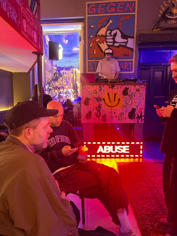 Neon-lit club night in Moscow, late June evening