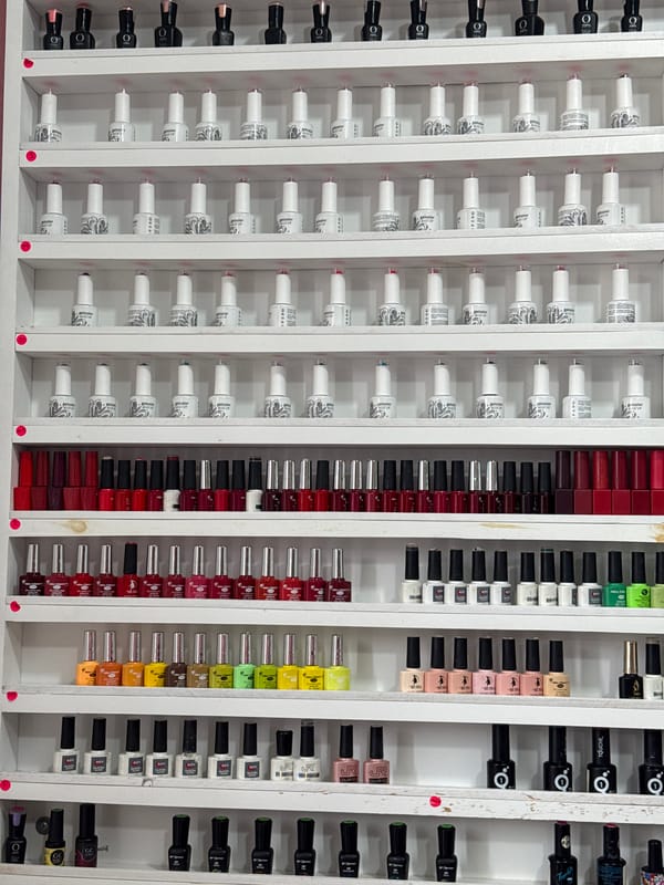 Nail polish display documented at Cholula beauty establishment