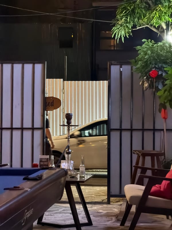 Evening social gathering documented at Vietnamese bar in Đà Nẵng