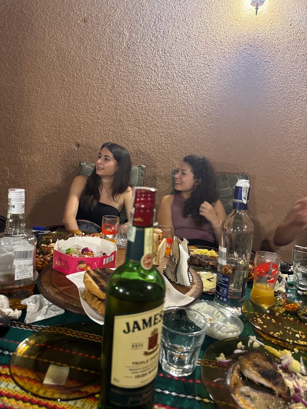 Casual evening gathering around food and drinks in Yambol