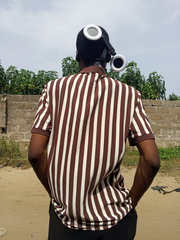 Content creator films with equipment in Badagry, Nigeria