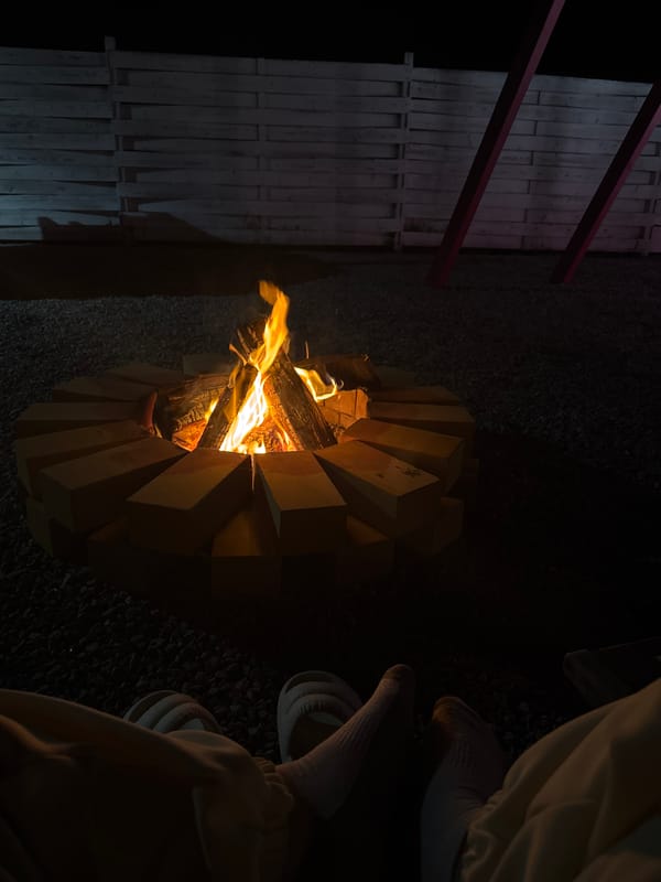 Evening fire pit gathering with hookah in Pad', Russia