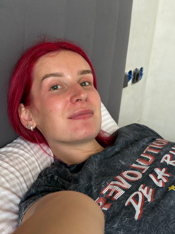 Indoor selfie in Chaikovsky with bold red hair