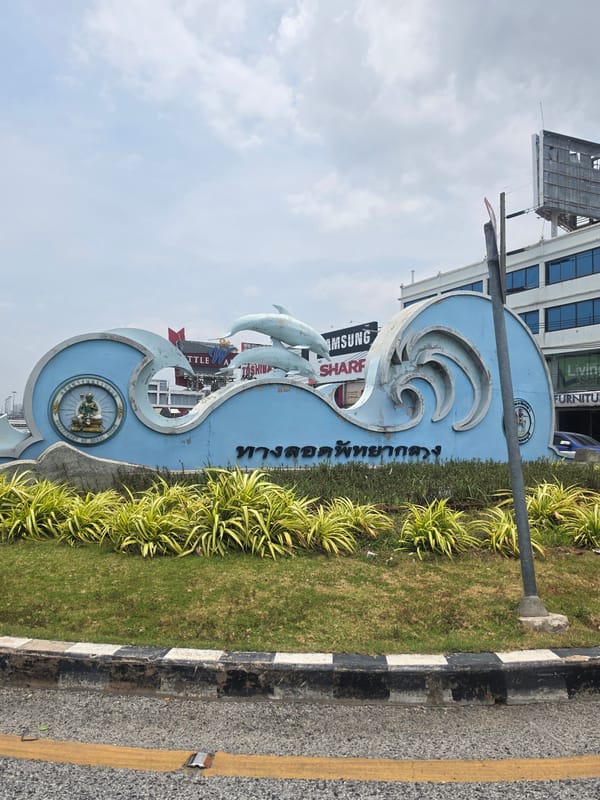 Pattaya City entrance monument with wave patterns documented