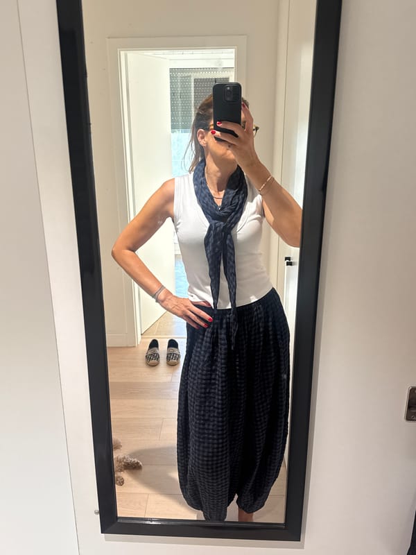 Woman takes mirror selfie in Loures, Portugal