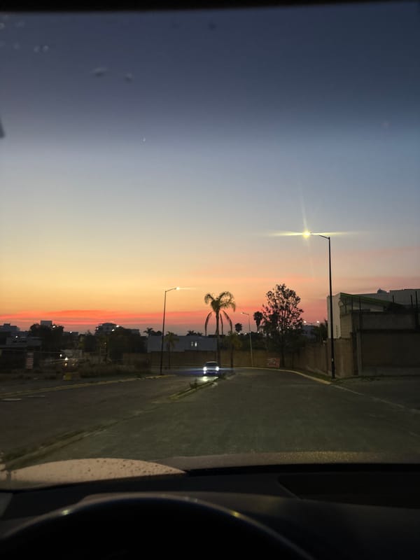 Twilight scene captured from vehicle in Tlaxcalancingo, Mexico