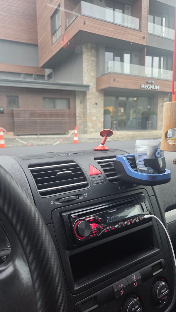 Car interior details and a worn concrete corridor