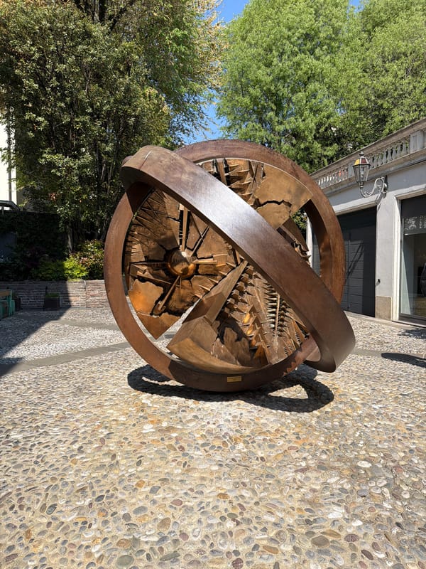 Tourist documents historic landmarks during Bergamo walking tour