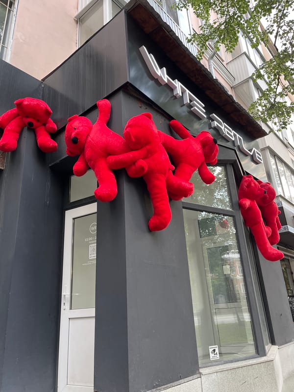 Red teddy bear art installation spotted on Yekaterinburg building