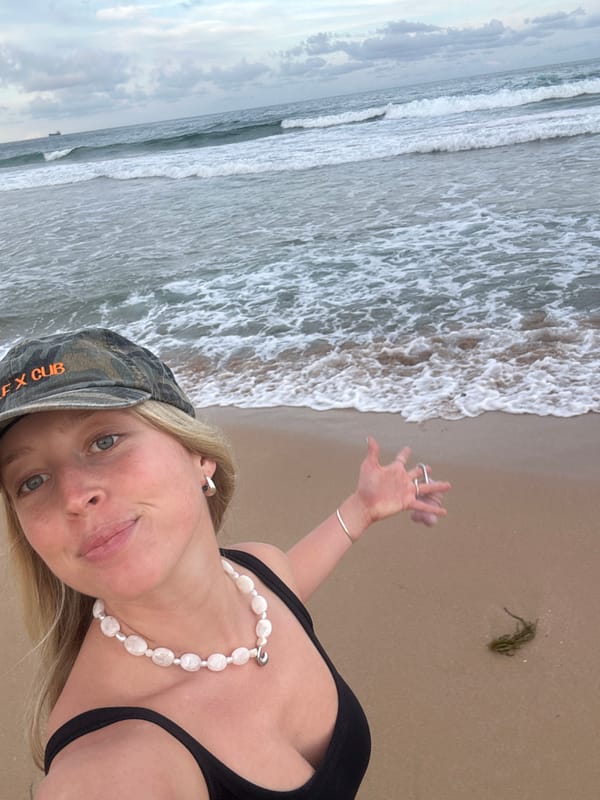 Beachgoers photographed at Bulli beach Wednesday morning