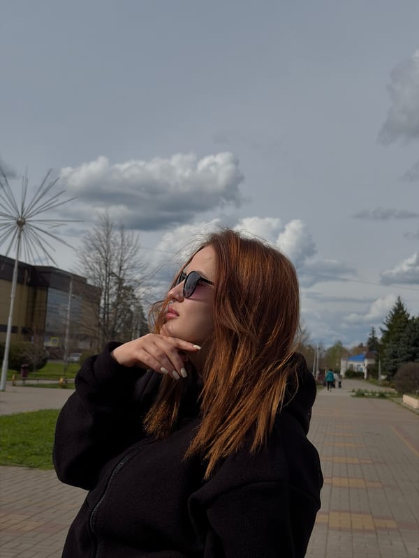 Mother and baby enjoy morning cafe visit in Novopokrovskaya
