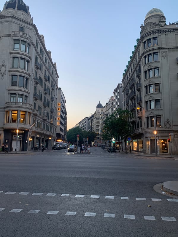 Saturday evening on a Barcelona street, Viena sign glowing