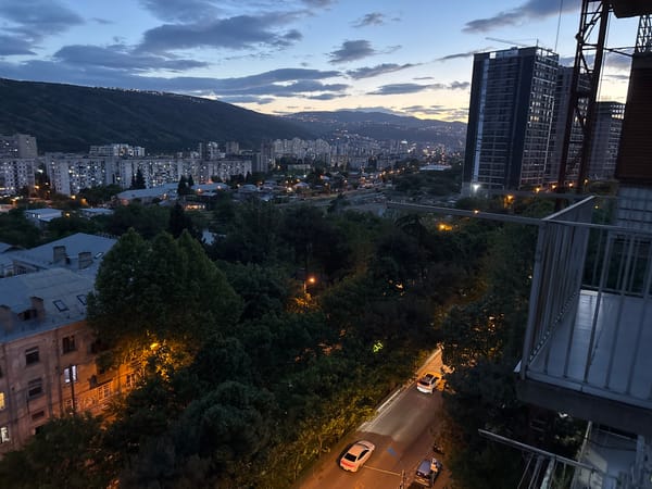 Evening gathering documented across Tbilisi cityscape and indoor spaces