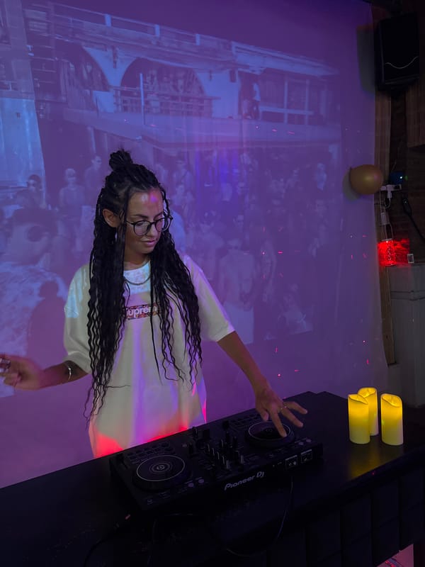 DJ session at a neon-lit bar in Nha Trang