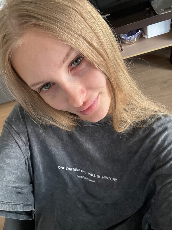 Woman takes selfies in Perm wearing literary t-shirt