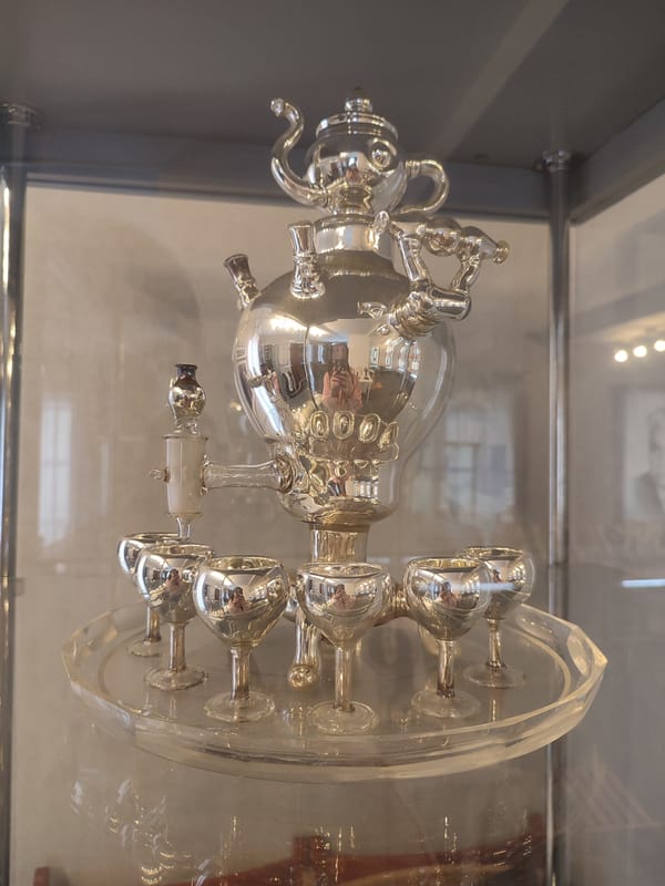 Museum visitor documents Russian cultural exhibits and architecture in Sarapul