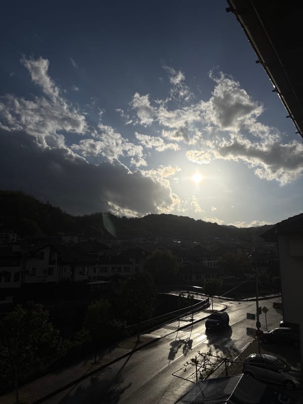 Rainbow appears over Bulgarian mountain town during afternoon storms