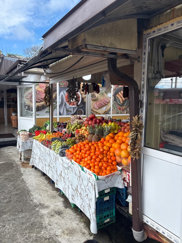 Market stalls selling fruits and sweets photographed in Sochi
