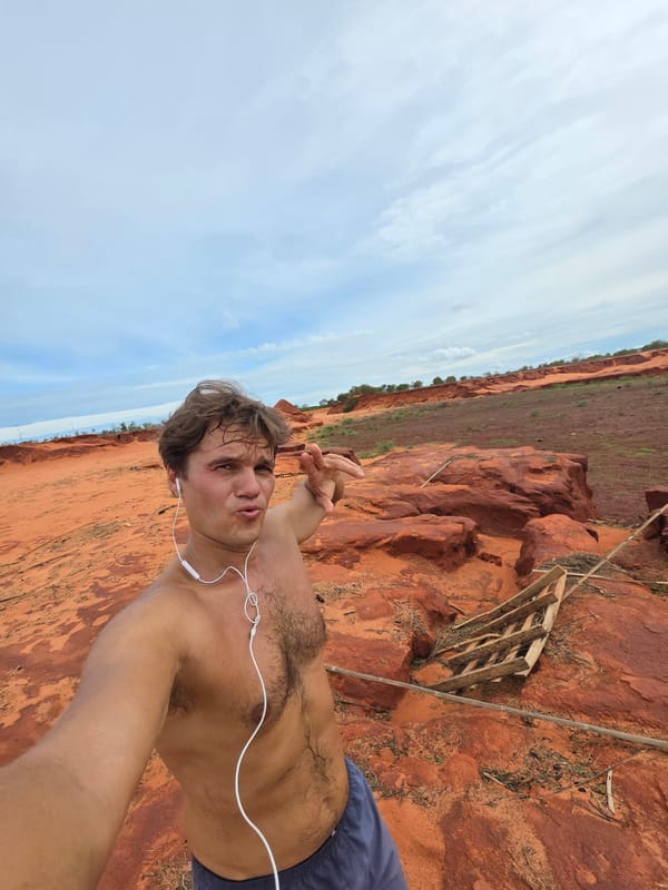 Tourist takes selfie at Mui Ne red dunes