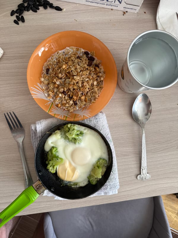 Morning breakfast prep meets a blooming garden and city streets