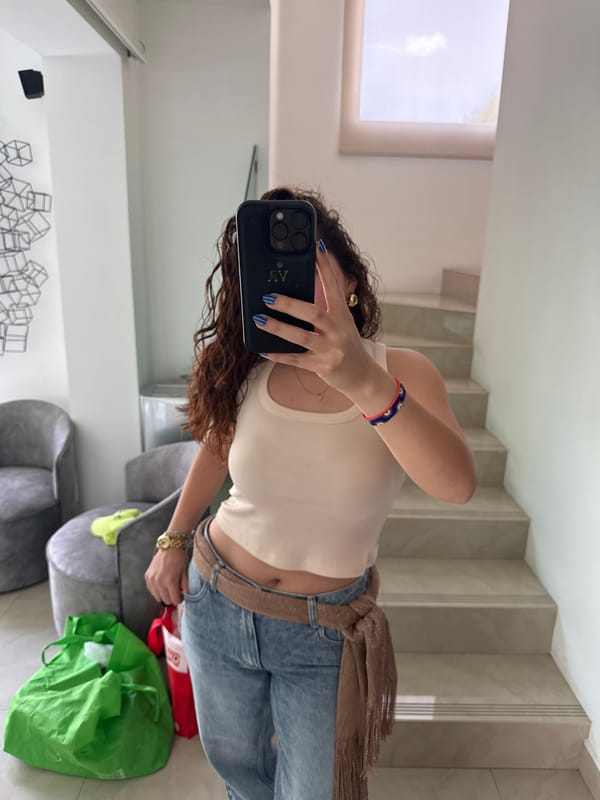 Woman using mobile phone indoors in Santa Clara Ocoyucan