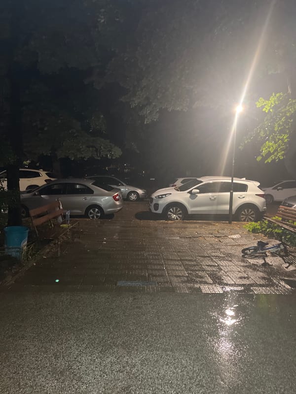 Rainy evening in Plovdiv, football jerseys and wet streets