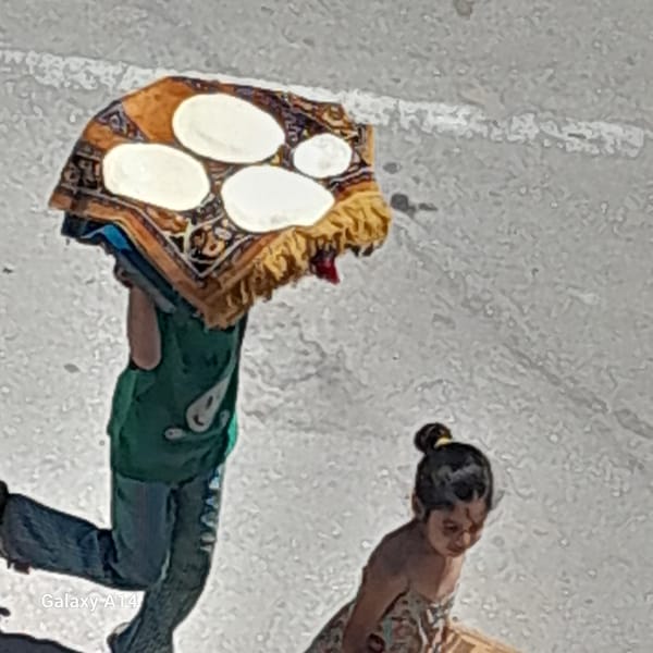 Street commerce and daily movement in Khan Yunis