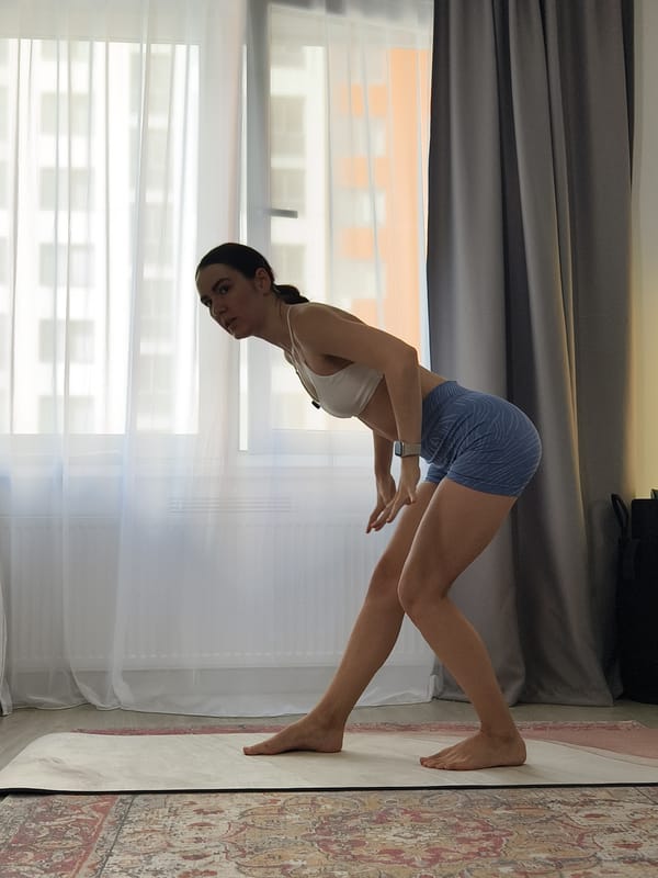 Woman records home yoga session in Tyumen, Russia