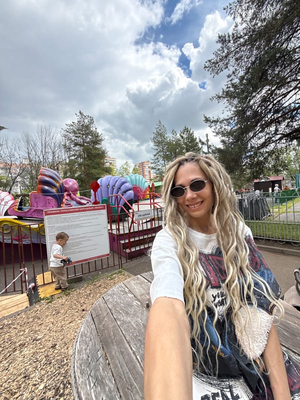 Woman takes selfie at Russian amusement park