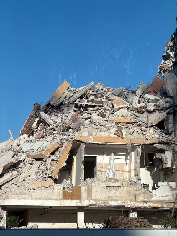 Building collapse and street-level scenes from Tel Aviv