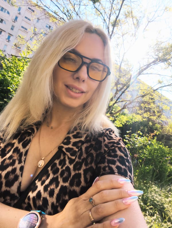 Woman photographed multiple times in outdoor Sevastopol setting