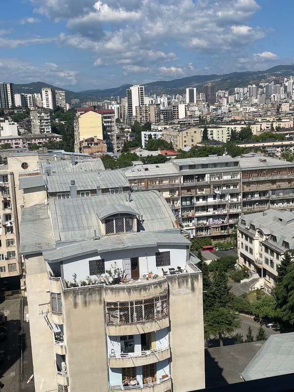 Morning around Tbilisi — streets, rooftops, and everyday interiors